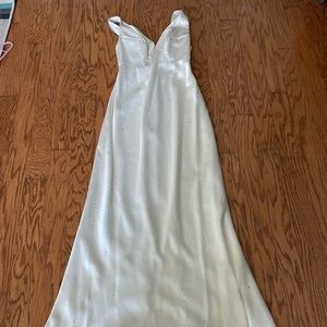Never worn wedding dress. Swarovski crystal embellishments